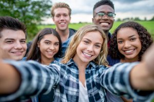 Diverse group of students taking a selfie